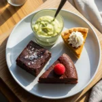Assorted gluten-free desserts platter with mousse and fresh fruit