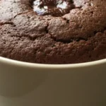 5-minute chocolate mug cake with a fudgy center in a ceramic mug