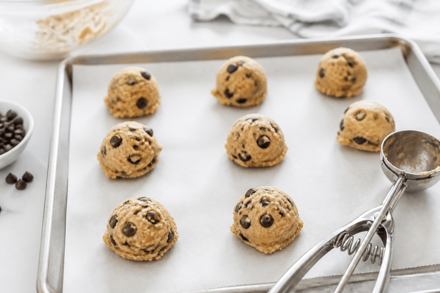 Easy Chocolate Chip Cookies Recipe easy chocolate chip cookies recipe dough balls scooped on parchment paper